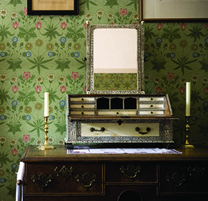 A bedroom with William Morris wallpaper at Wightwick Manor & Gardens, Staffordshire